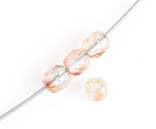 Fire-Polished Round 4mm - Transparent Pink Shades Strung