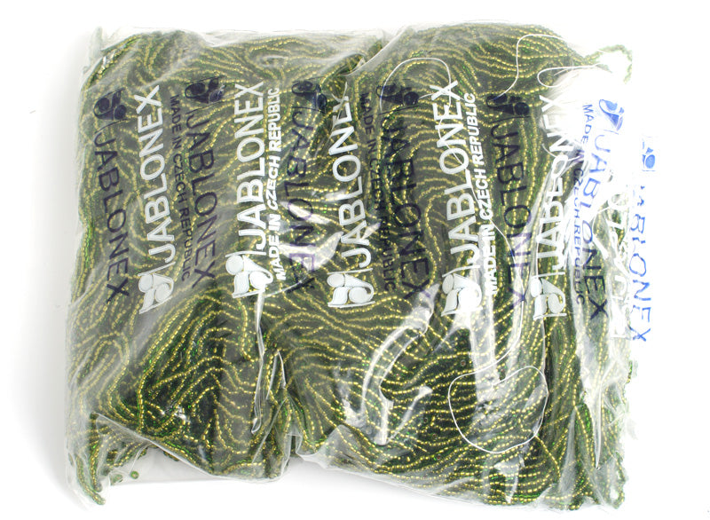 Czech Seed Beads 11/0 Transparent Green Copperlined