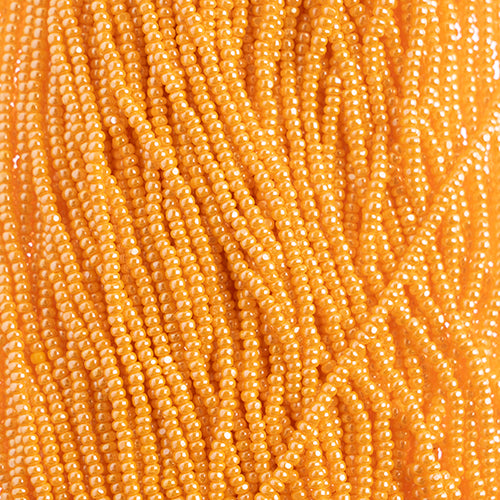 Czech Seed Beads 8/0 Cut Opaque Light Orange Luster Strung