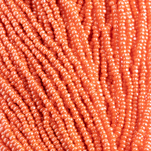 Czech Seed Beads 8/0 Cut Opaque Orange Luster Strung